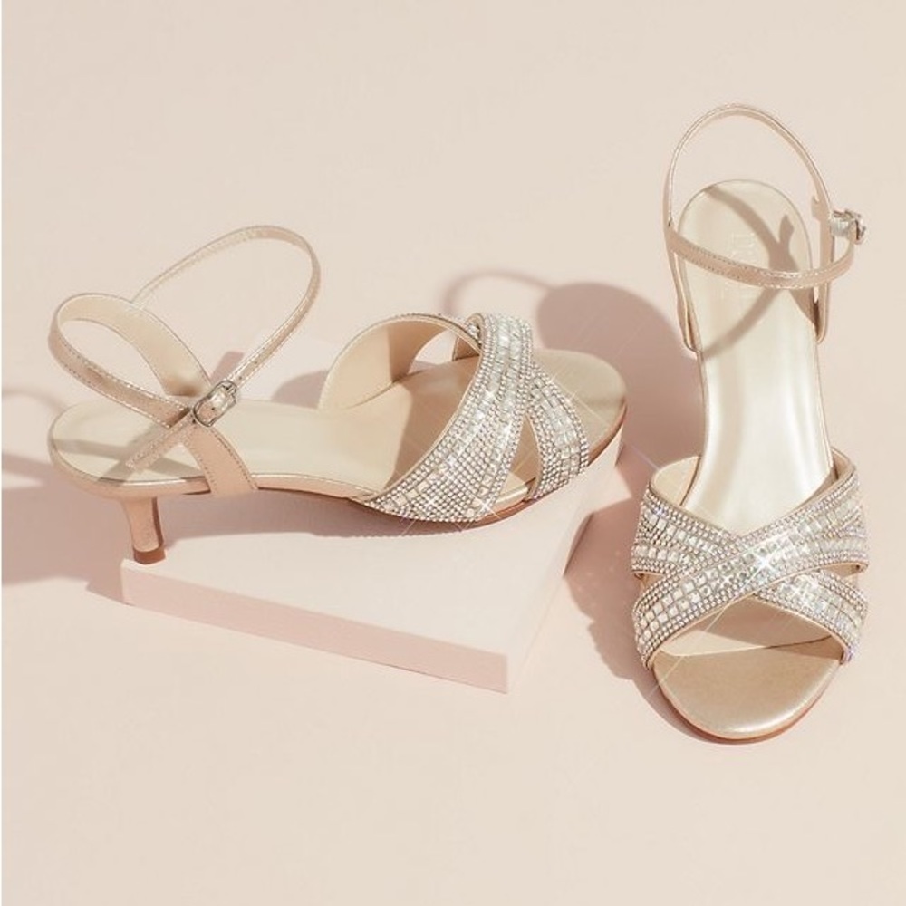 David’s Bridal crisscross heels with adjustable strap. Size 8.5 with a 2” heel.